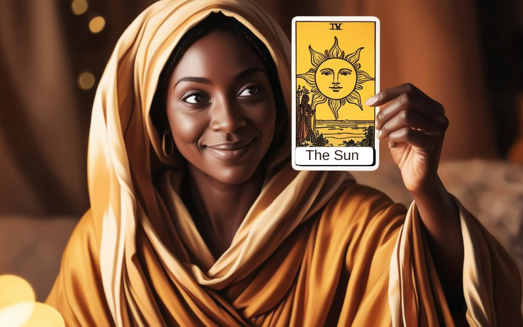 A Tarot Reder holding The Sun card.