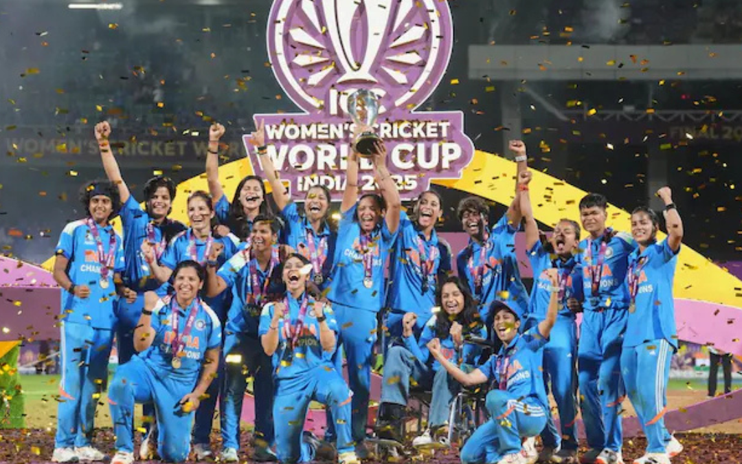 ndian women’s cricket team celebrating World Cup 2025 victory while symbolic shadow of violence represents women’s safety issues in India.