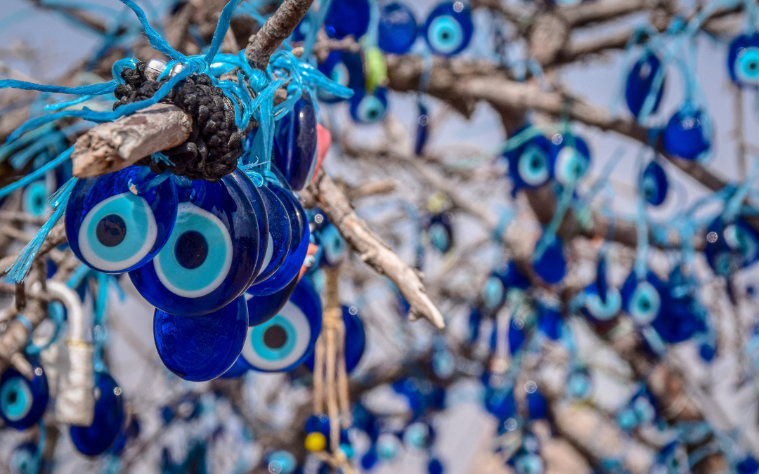 ngo-illustration-Artboard 5 Evil eye beads hanging on a tree symbolising protection from nazar and negative energy